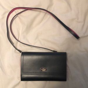 Used black and pink Kate Spade crossbody clutch